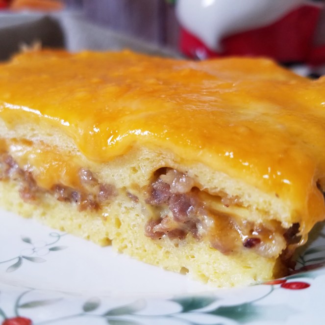 Mom's Overnight Make-Ahead Christmas Morning Breakfast Casserole with sausage, eggs, and cheese.